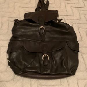 Soft leather gently used London Fog Backpack. Unisex